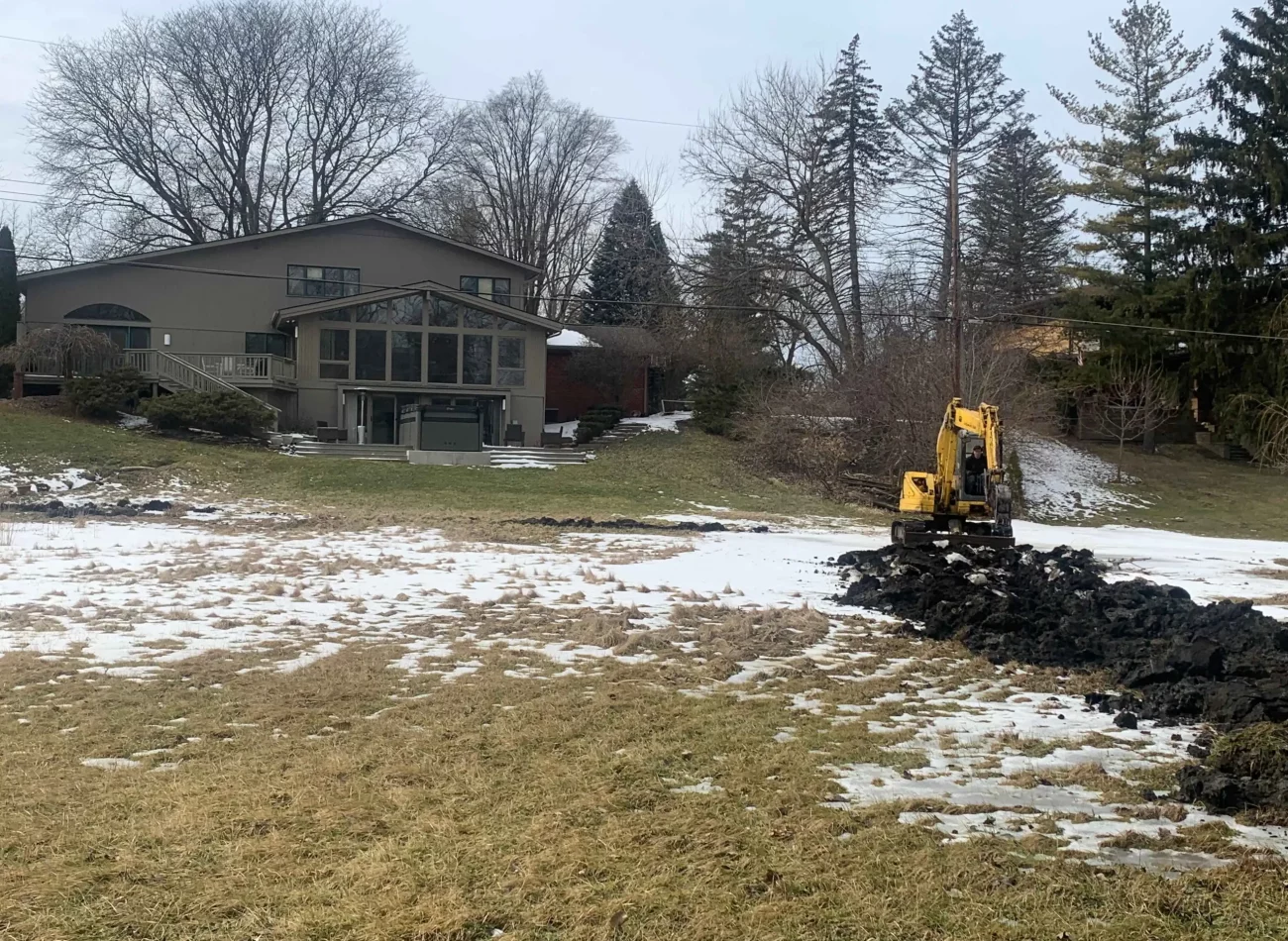 Snow-covered excavation process