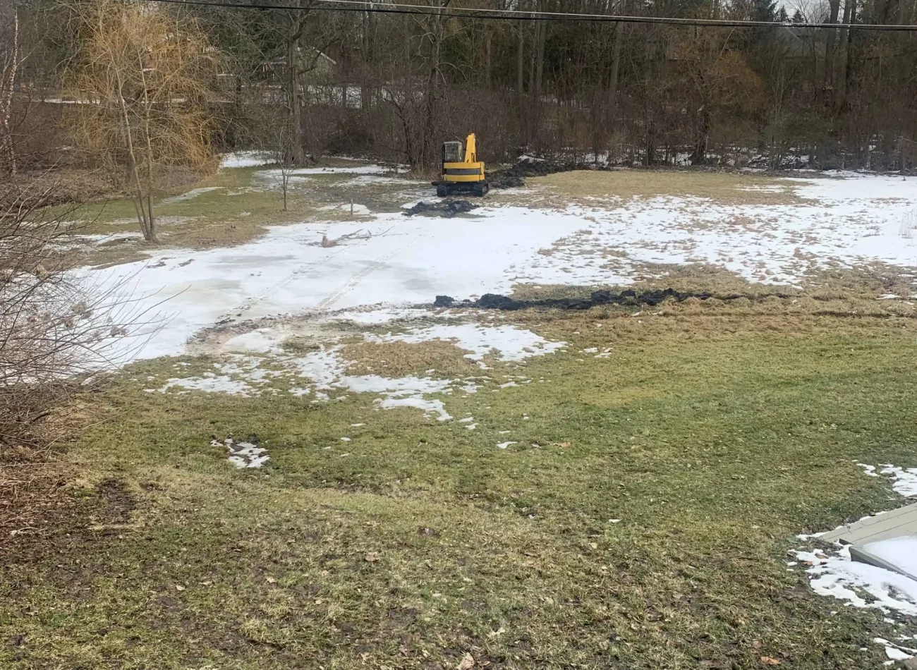 Restoring a Waterlogged Two-Acre Property with Custom Drainage Solutions in Bloomfield Hills, MI