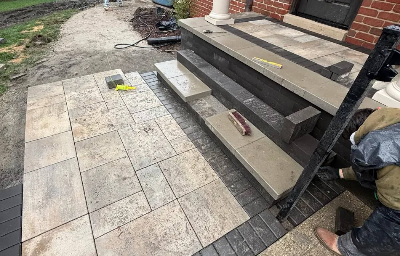 Professional landscape reconstruction in Bloomfield Hills with new paver patio and foundation rebuild
